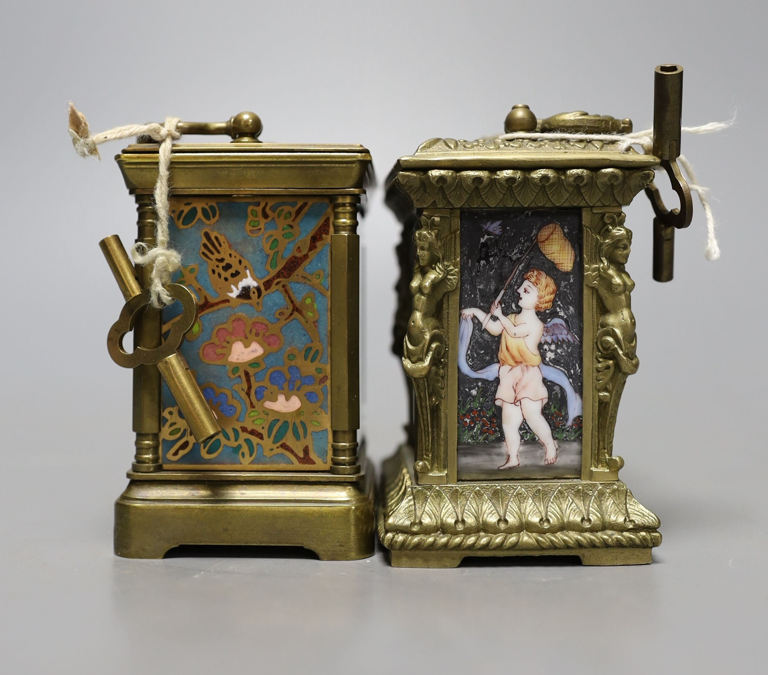 Two small reproduction brass and enamel and brass and cloisonné carriage timepieces, largest 8 cms high.